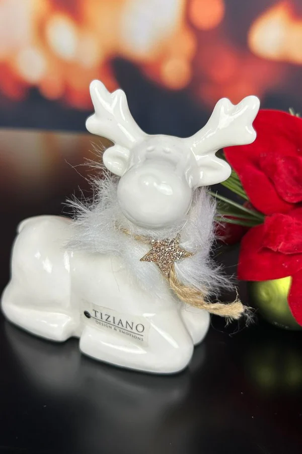 Deko Rentier Lars sitzend 8,5cm cremeweiß Deko Rentier Lars sitzend 8,5cm cremeweiß
