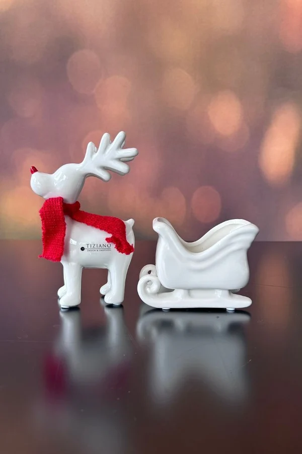Rentier Rudolph mit Schlitten weihnachtsdeko, schlitten, rentier, porzellan, figur